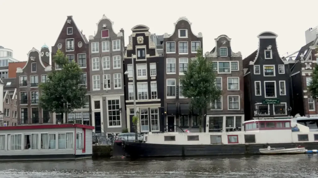 the city of tulips and dancing houses along the canal belts amsterdam the netherlands
