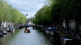 amsterdam canal belts boat city of tulips the netherlands {{brizy_dc_image_alt imageSrc=