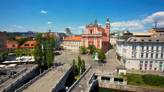 Triple bridge of ljubljana where nature meets the soul of a city tromostovje east europe slovenia
